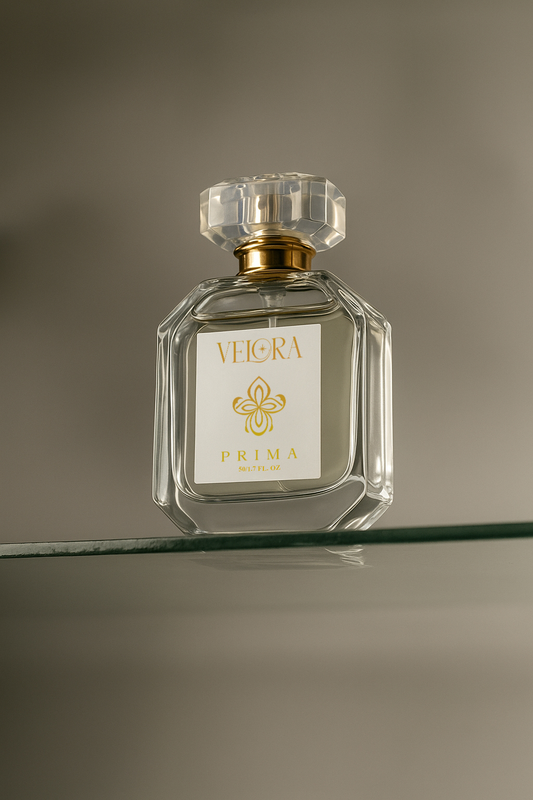 Velora Prima perfume bottle on a reflective surface